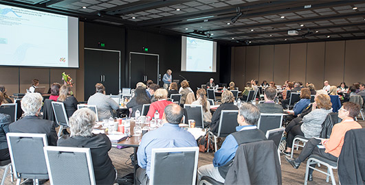 Attendees listen intently during the CQI Workshop