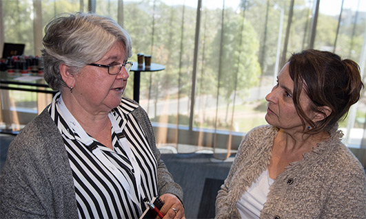 QAIHC’s Public Health Physician Sophie Couzos and Wuchopperen Health Service Limited CEO Debra Malthouse